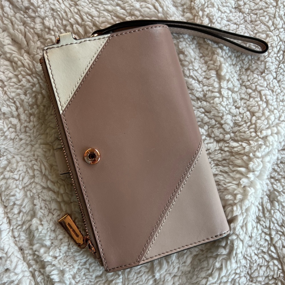 Michael Kor wallet. Room for cards, change, checkbook, and been your phone.